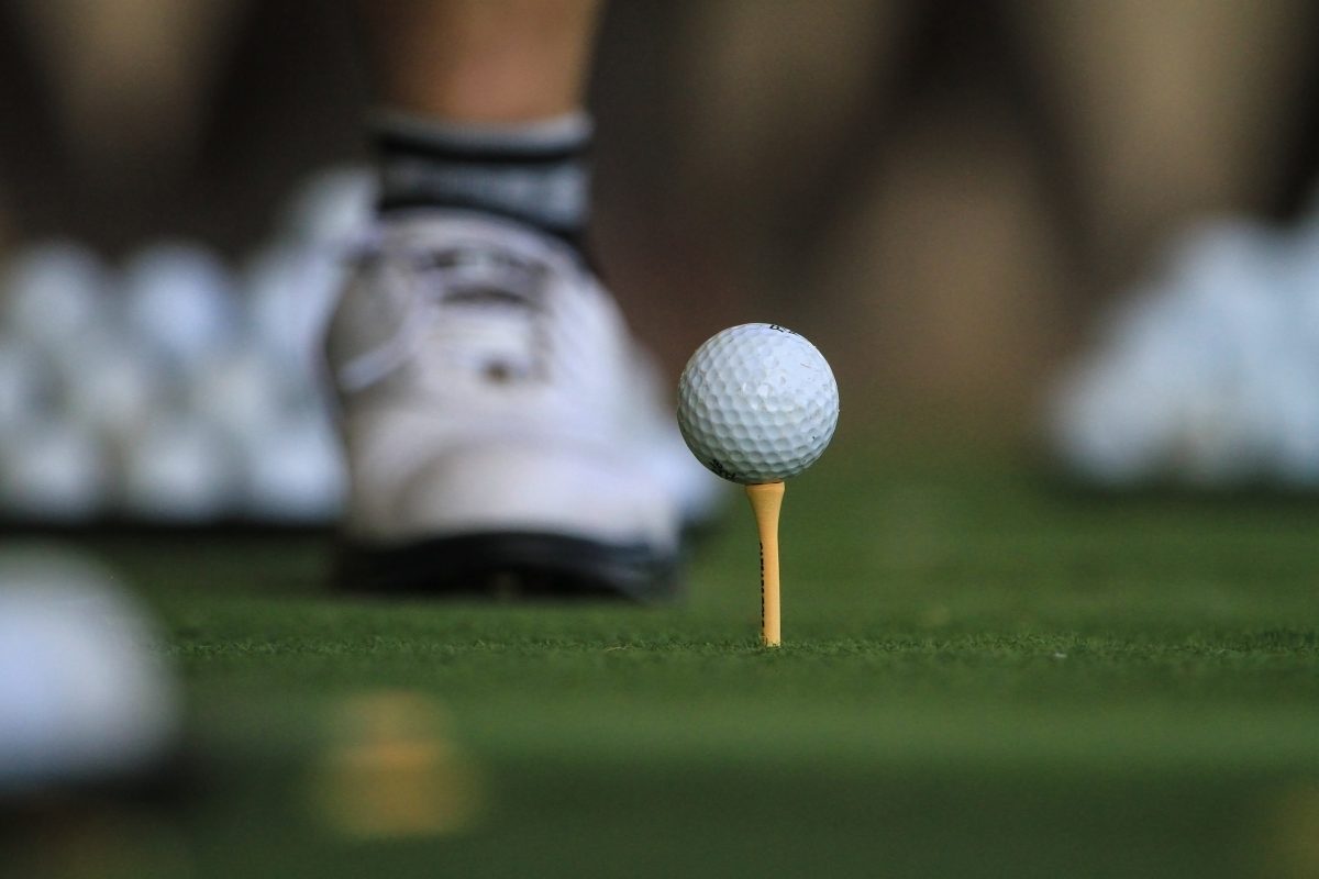 white golf ball on green grass field