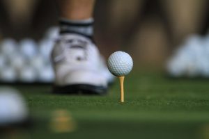 white golf ball on green grass field